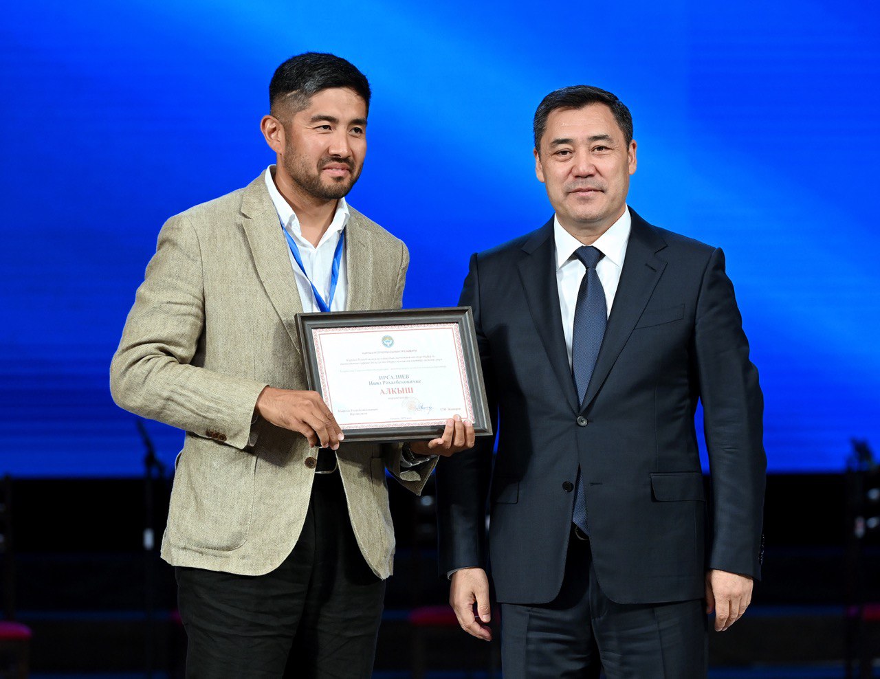 Honorary Consul Niyaz Irsaliev receiving Presidential Commendation from H.E. Sadyr Japarov